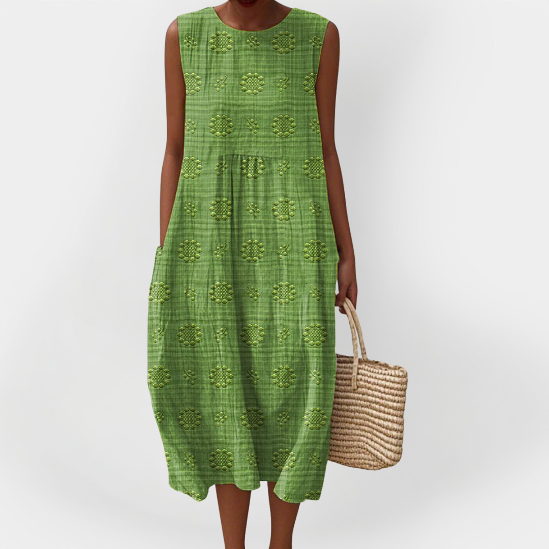 Elegantní Bavlněné Šaty Bez Rukávů S Kapsami Midi Délka