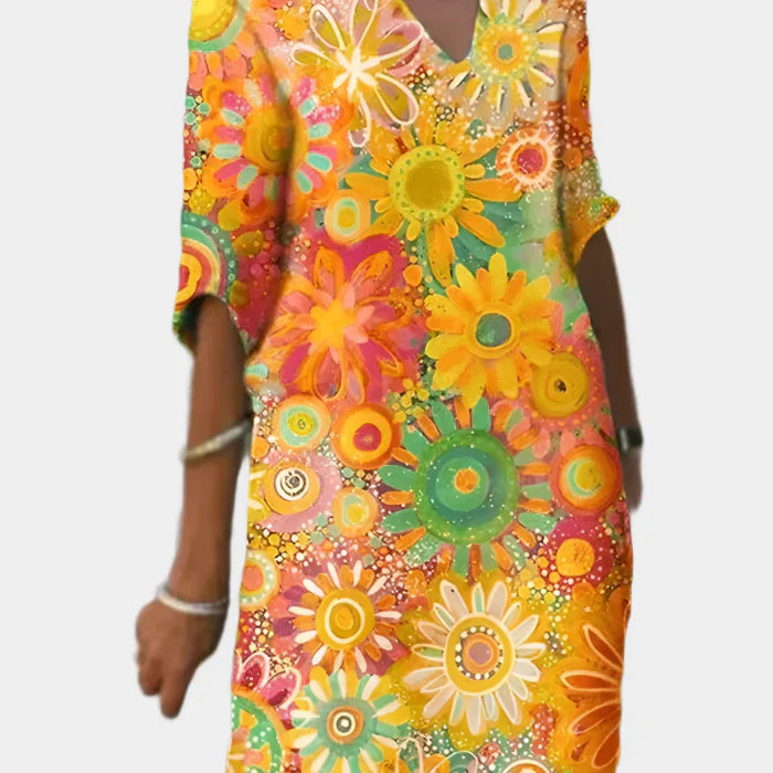 Barevné Letní Šaty S Květinovým Vzorem A Pohodlným Střihem